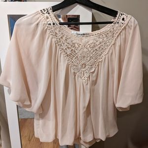 Forever 21 Bubble hem crocheted and semi sheer blouse